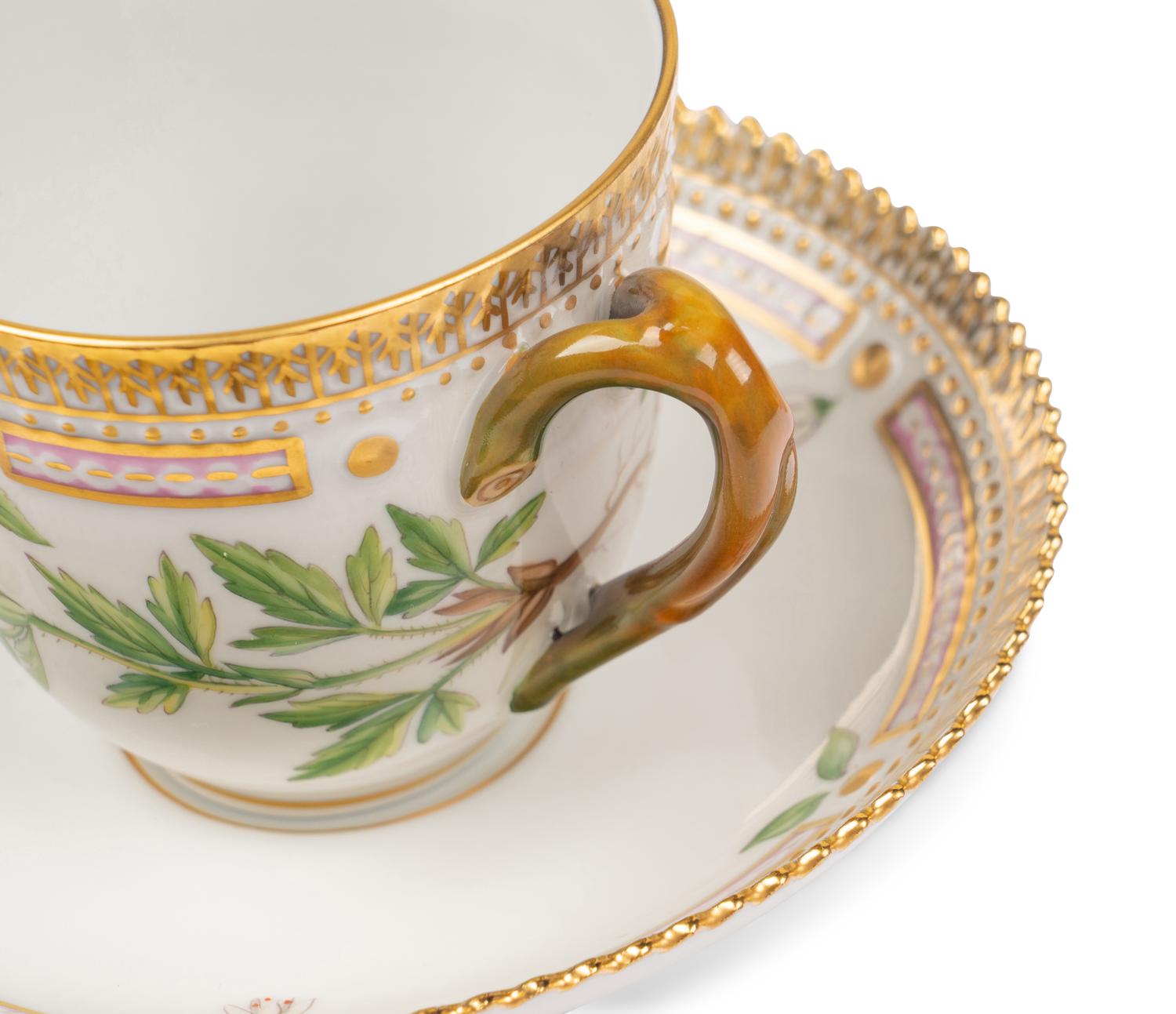 A Set of Twelve Royal Copenhagen Flora Danica Porcelain Teacups and Saucers