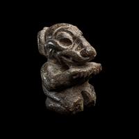 An Olmec Serpentine Kneeling Transformation Figure