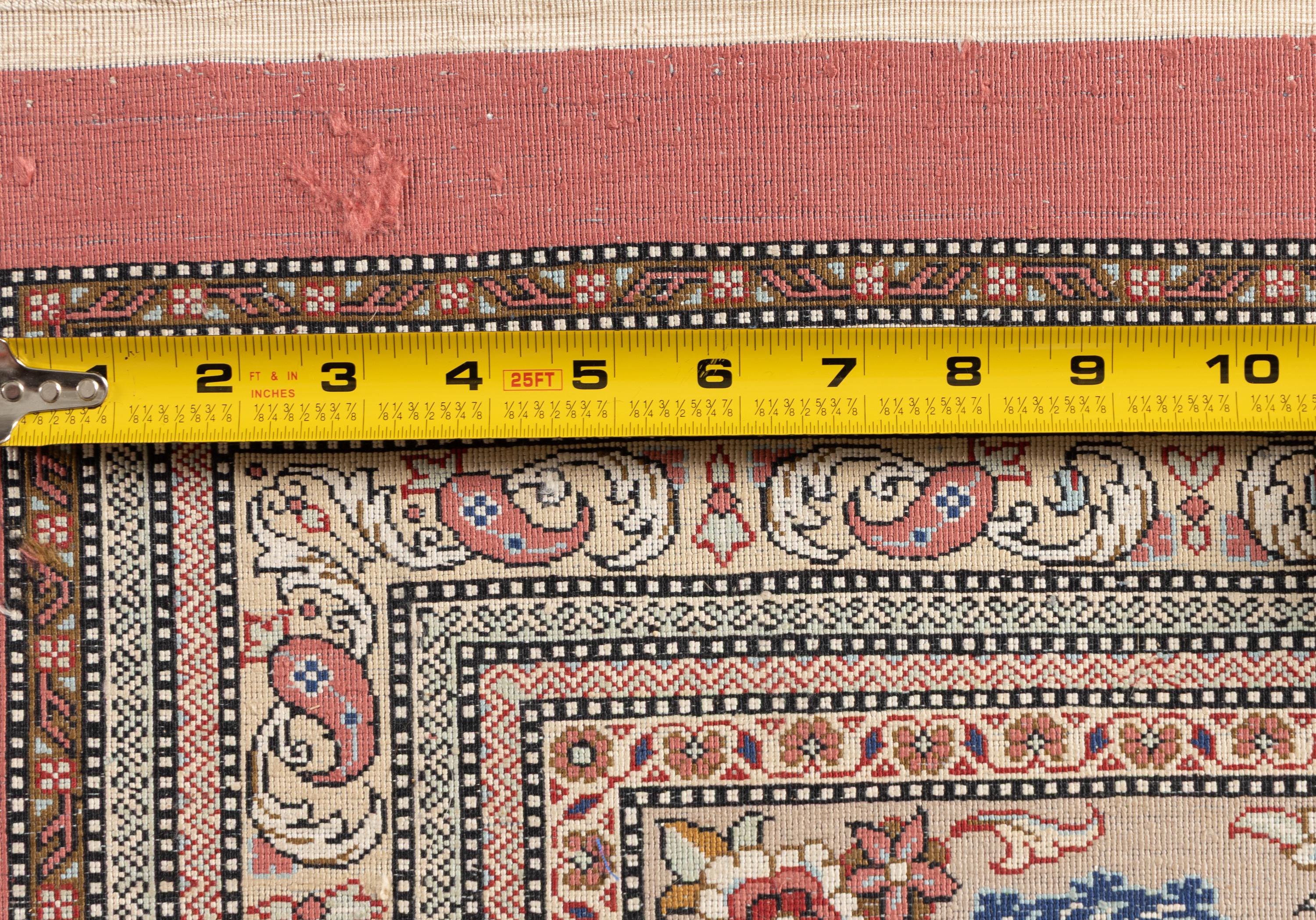 A Persian Silk Carpet