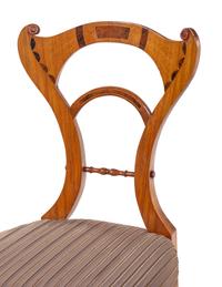 A Set of Four Biedermeier Inlaid Dining Chairs