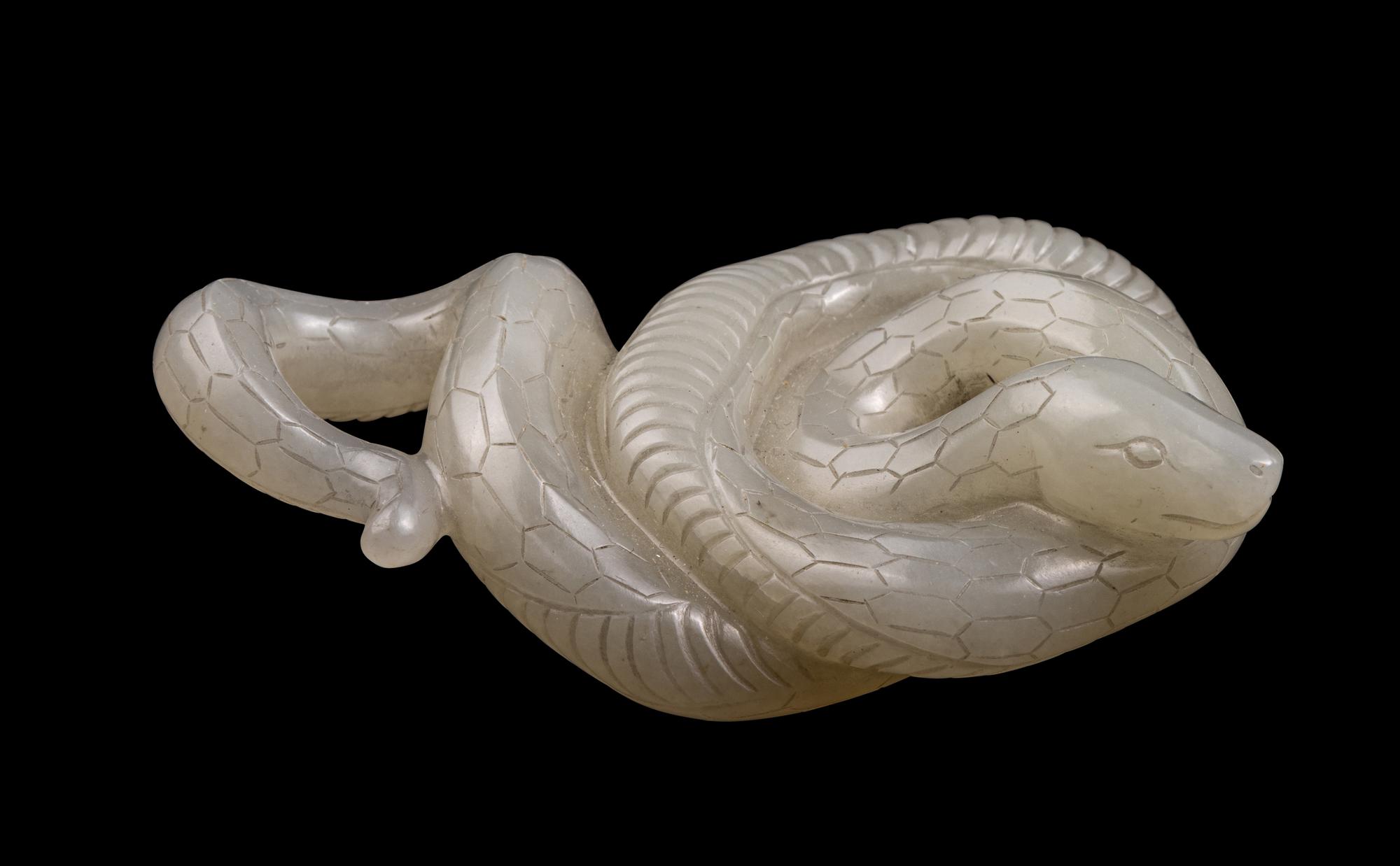 A Chinese Pale Celadon Jade Carving of a Snake