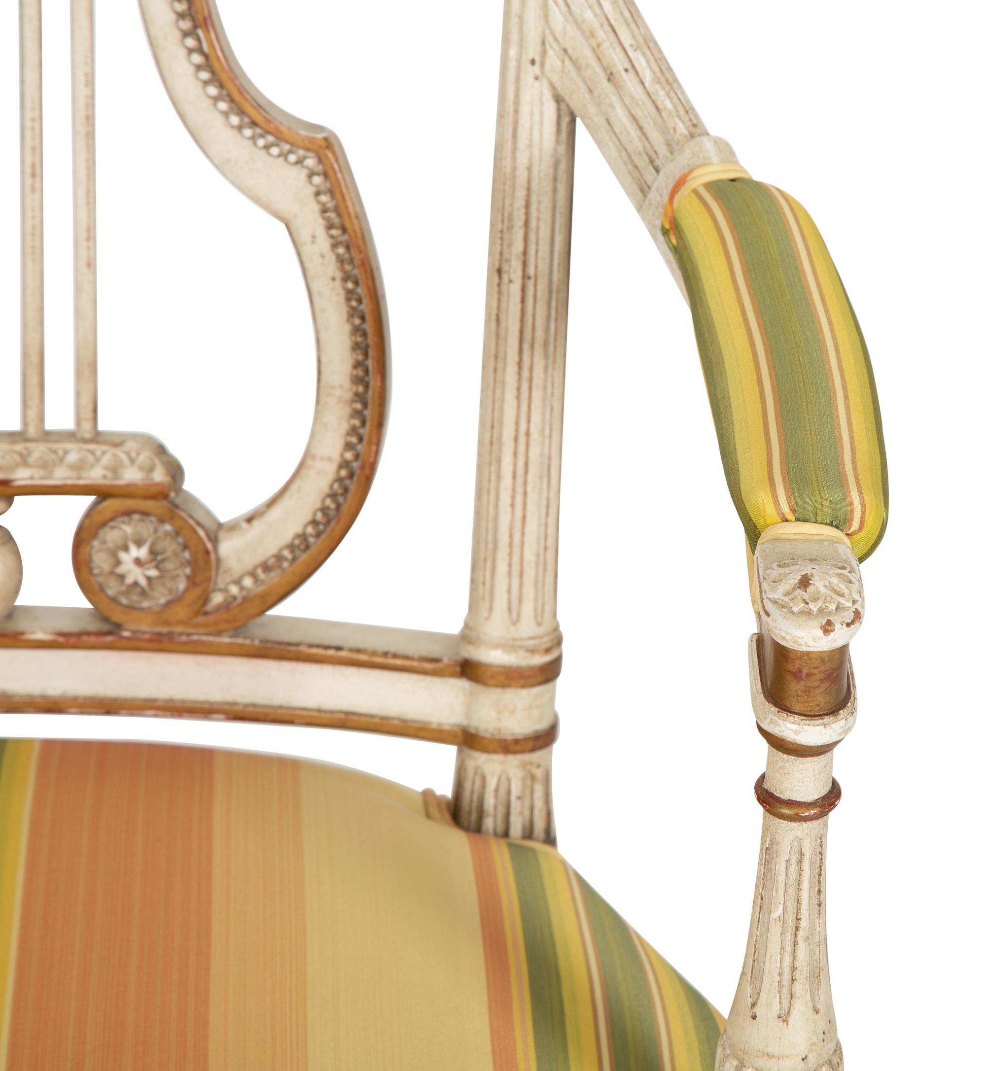 A Continental Painted and Parcel Gilt Fauteuil