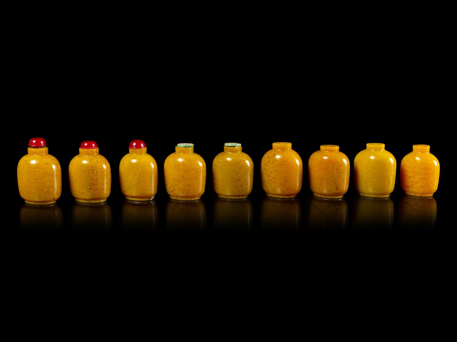 Nine Chinese Yellow Glass Snuff Bottles