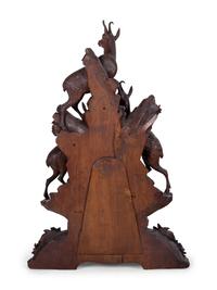 A Black Forest Carved Mantel Clock