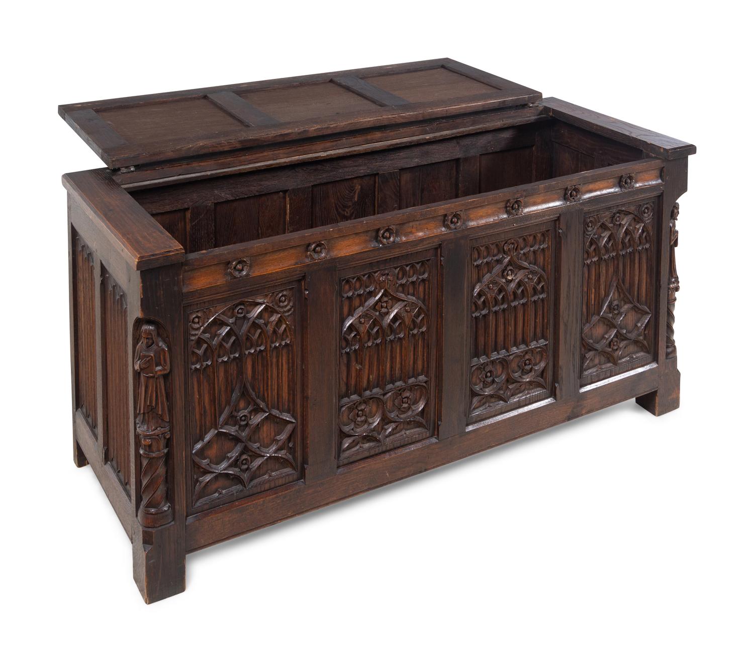 A Gothic Revival Carved Oak Chest