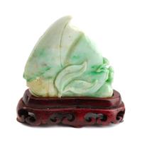 A Burmese Green Jade Figural Group Height 3 1/2 inches.