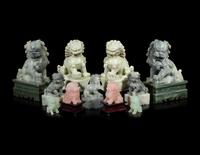 11 Chinese Figures of Seated Fu- Lions