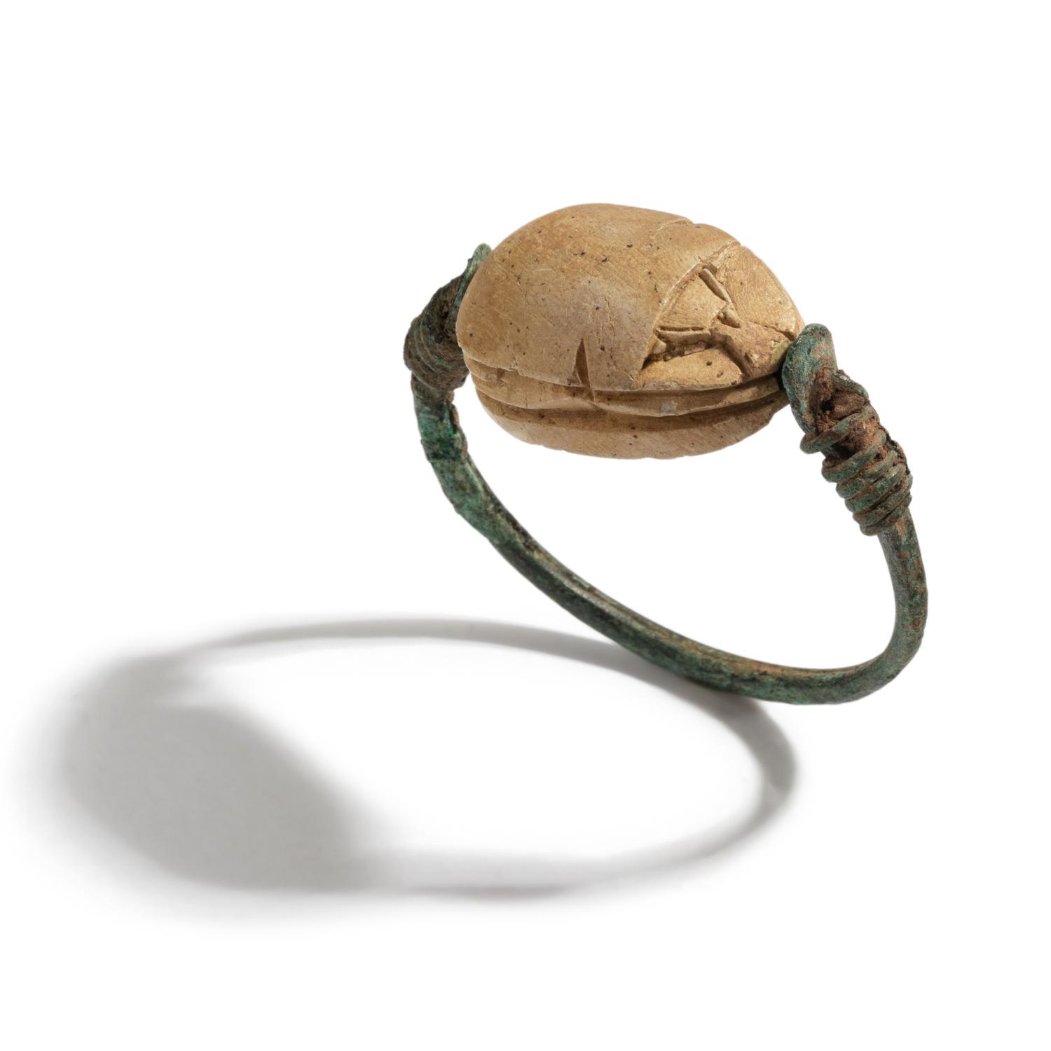 An Egyptian Bronze and 'Hyksos' Scarab Swivel Ring