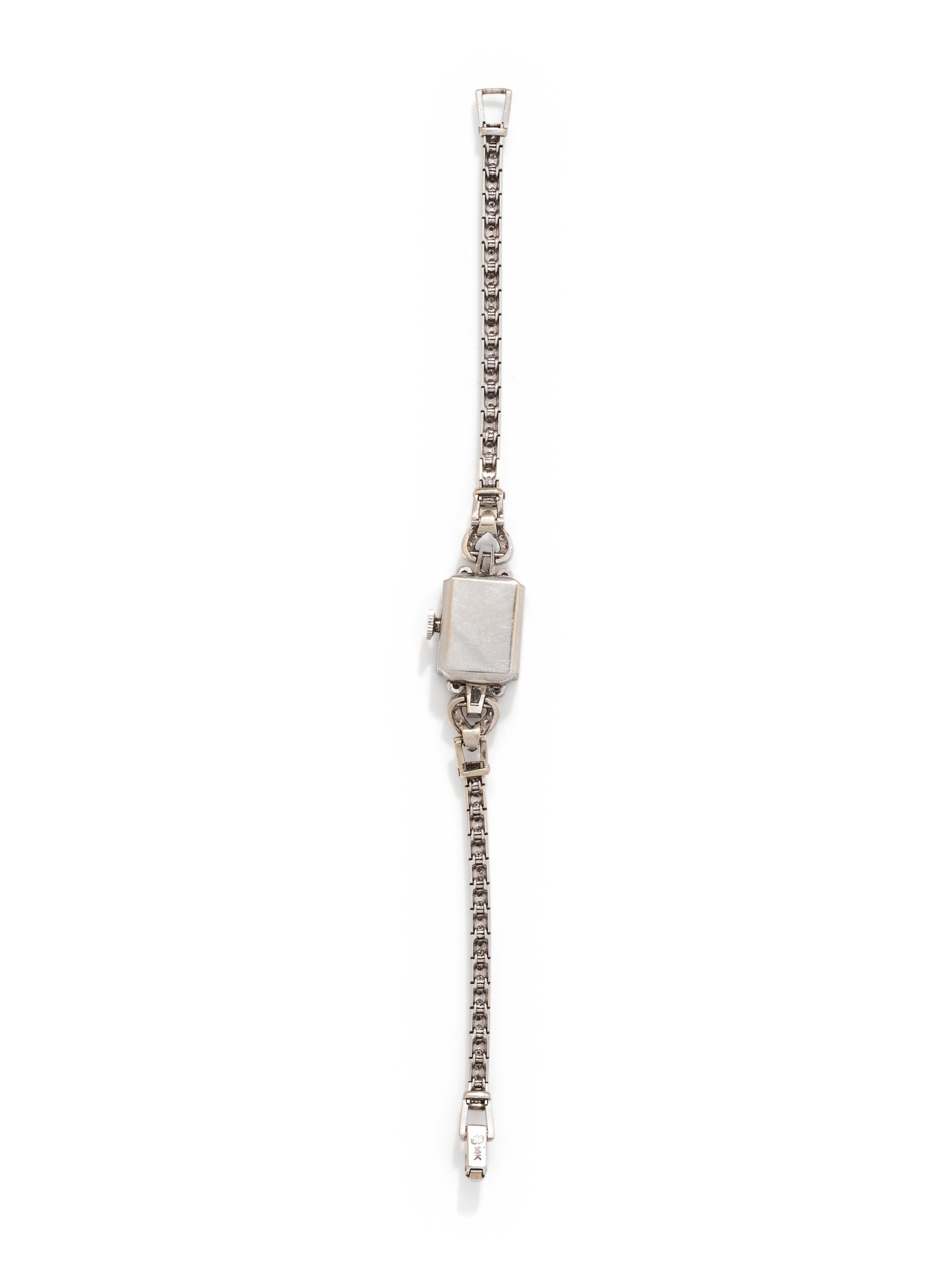 MOVADO, WHITE GOLD AND DIAMOND WRISTWATCH
