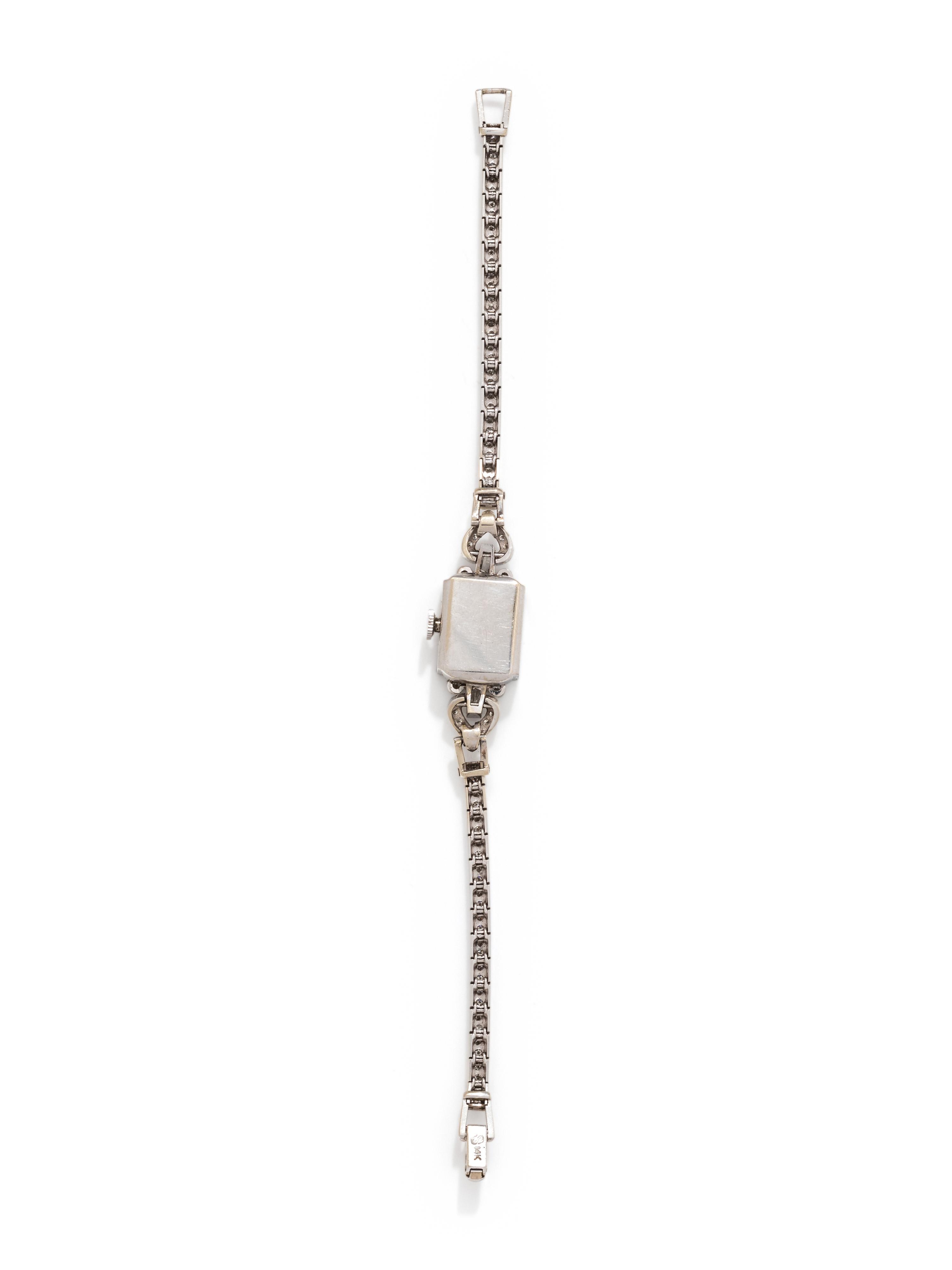 MOVADO, WHITE GOLD AND DIAMOND WRISTWATCH