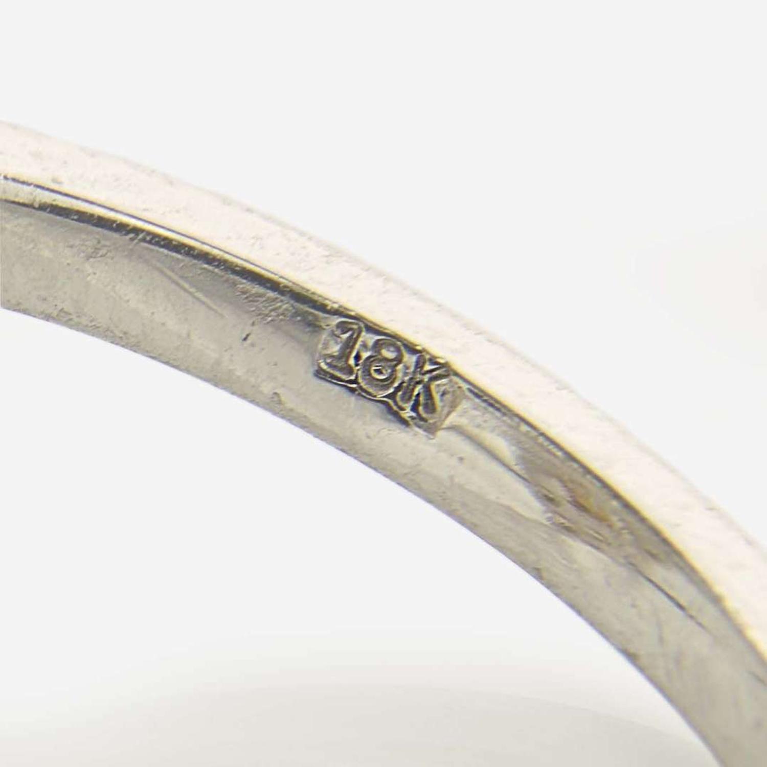 An 18K White Gold, Diamond, and Yellow Diamond Ring 1.31 Carat Fancy Light Yellow Marquise-Cut Diamond, GIA Certified