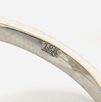 An 18K White Gold, Diamond, and Yellow Diamond Ring 1.31 Carat Fancy Light Yellow Marquise-Cut Diamond, GIA Certified