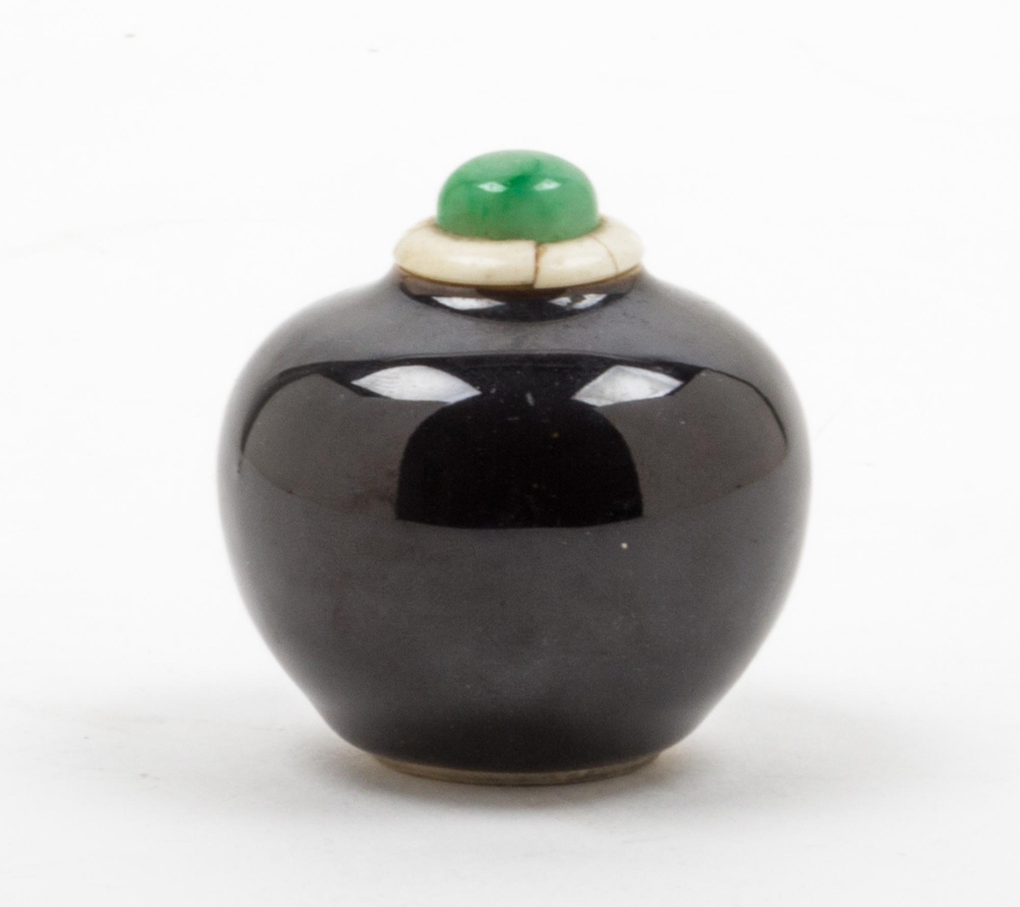 A Mirror Black Glazed Porcelain Jarlet Height 2 1/4 inches.