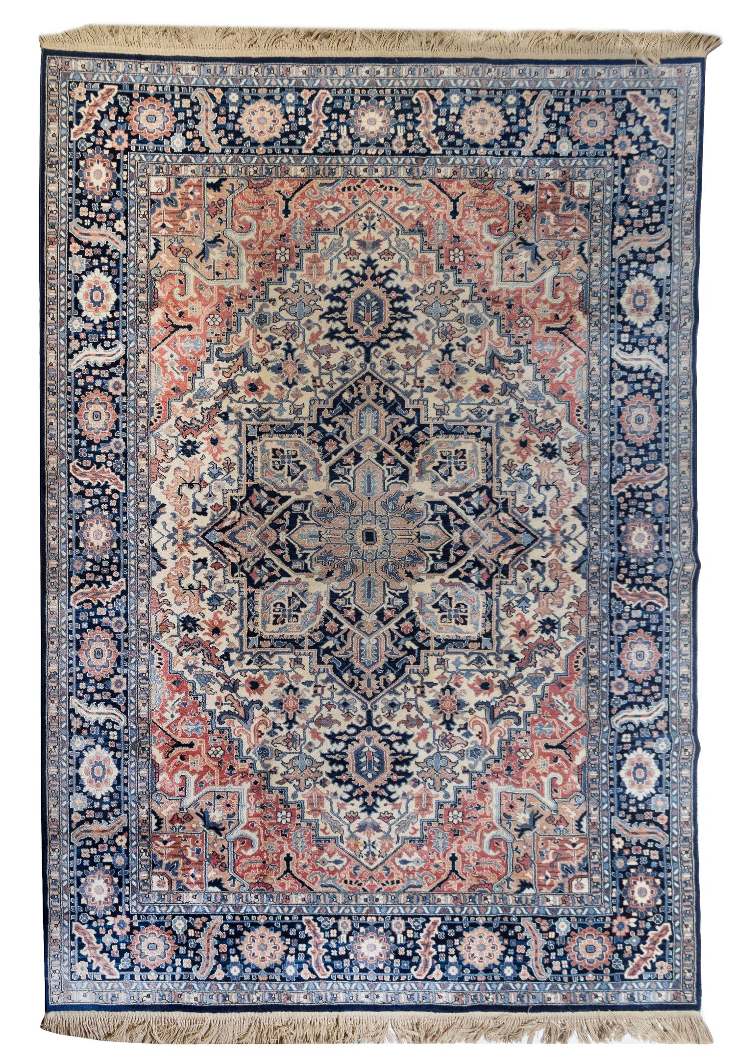 An Indo-Oushak Wool Rug 14 feet x 10 feet.