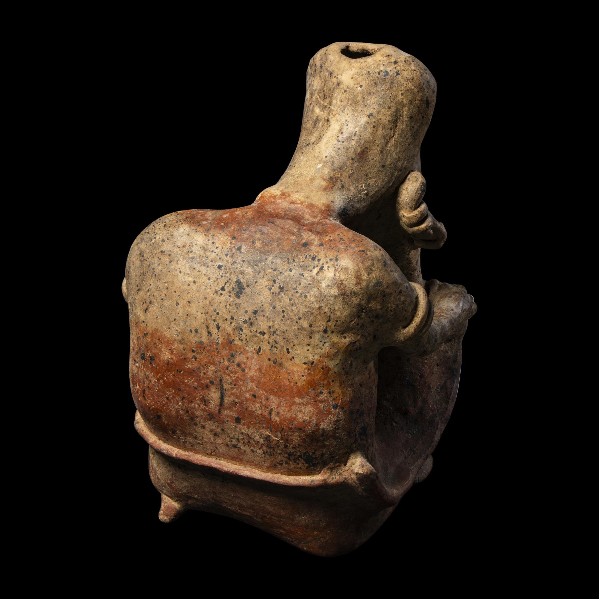 A Jalisco Terracotta Seated Figure