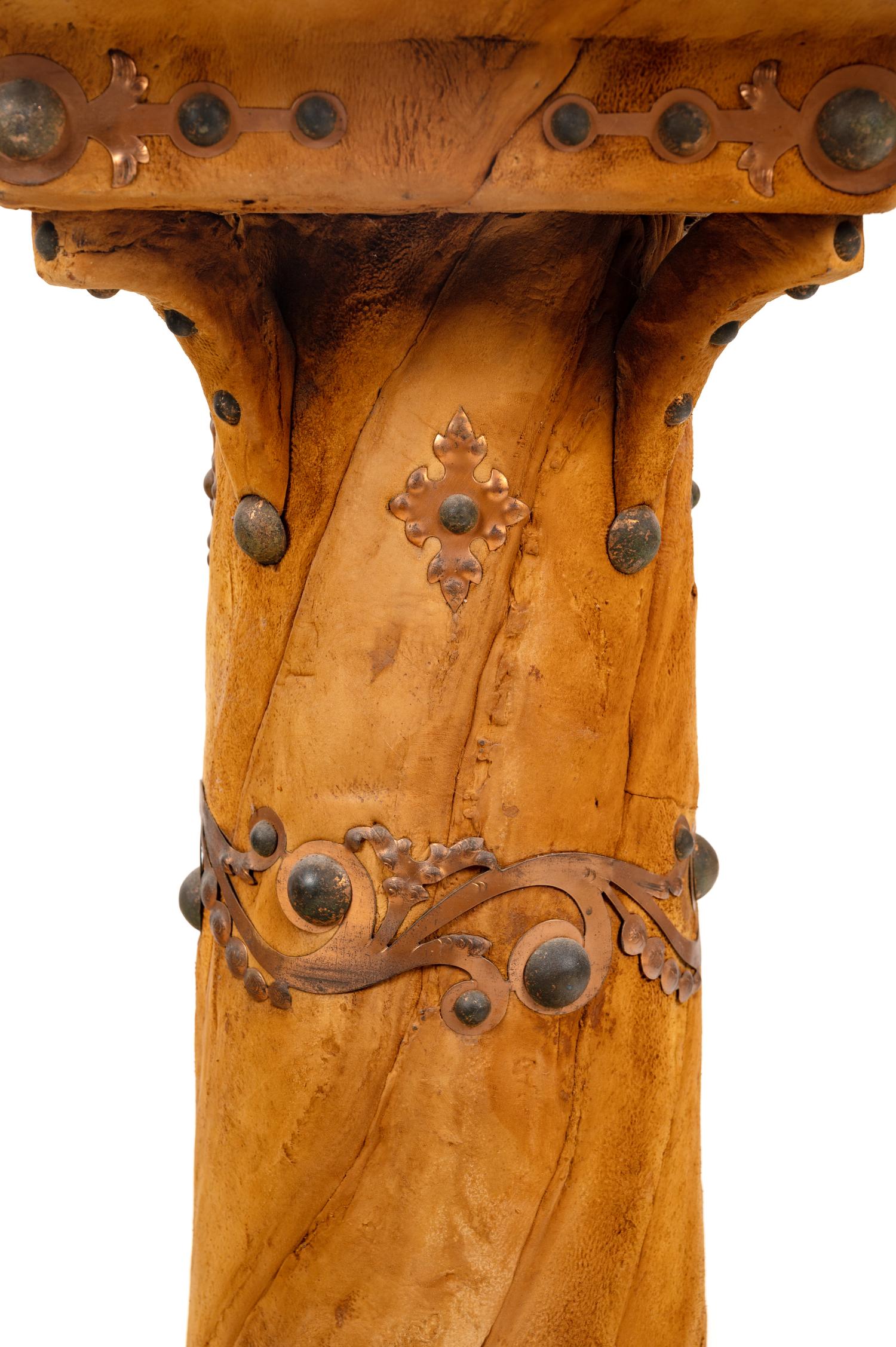 A Nailhead Decorated Leather Clad Pedestal