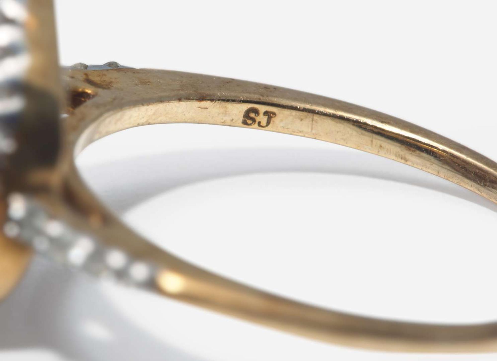 A Collection of Two Gold, Diamond, and Gemstone Rings