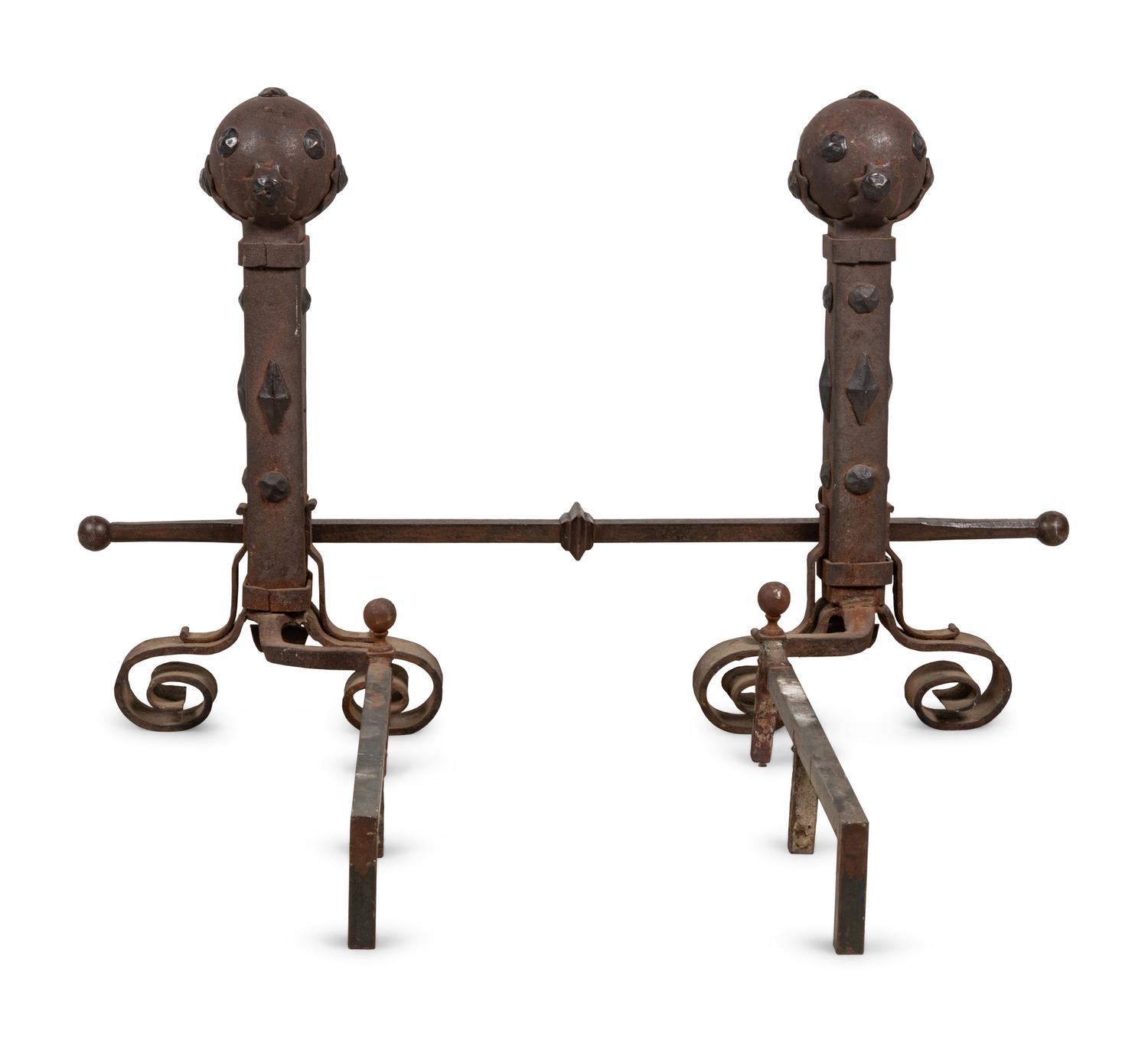 A Pair of Continental Gothic Style Iron Andirons