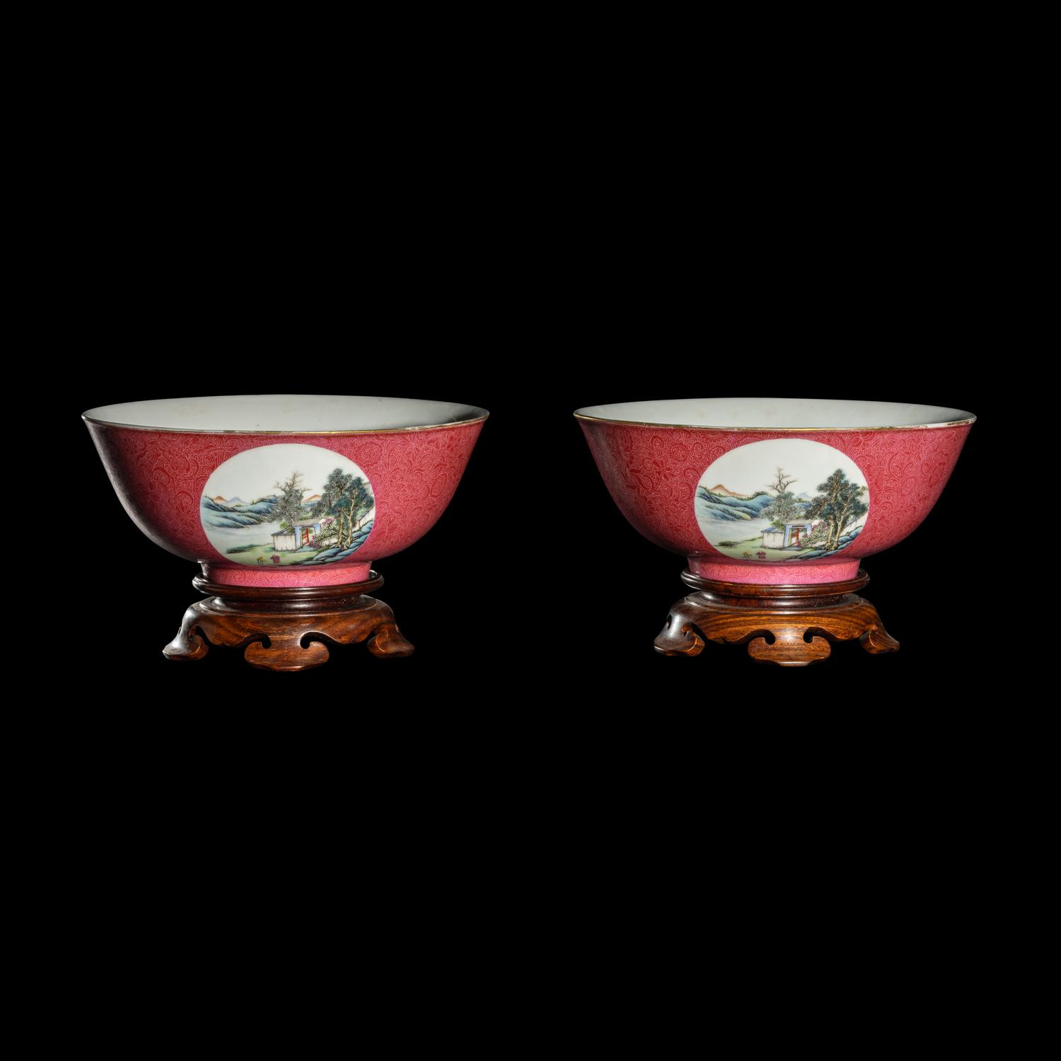 A Pair of Chinese Famille Rose Ruby Ground Porcelain 'Landscapes' Bowls, 20th Century 近代 胭脂紅地軋道開光山水圖碗一對