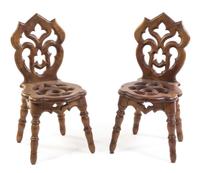 A Pair of German Folk Chairs Height 31 x width 14 1/2 x depth 18 inches.