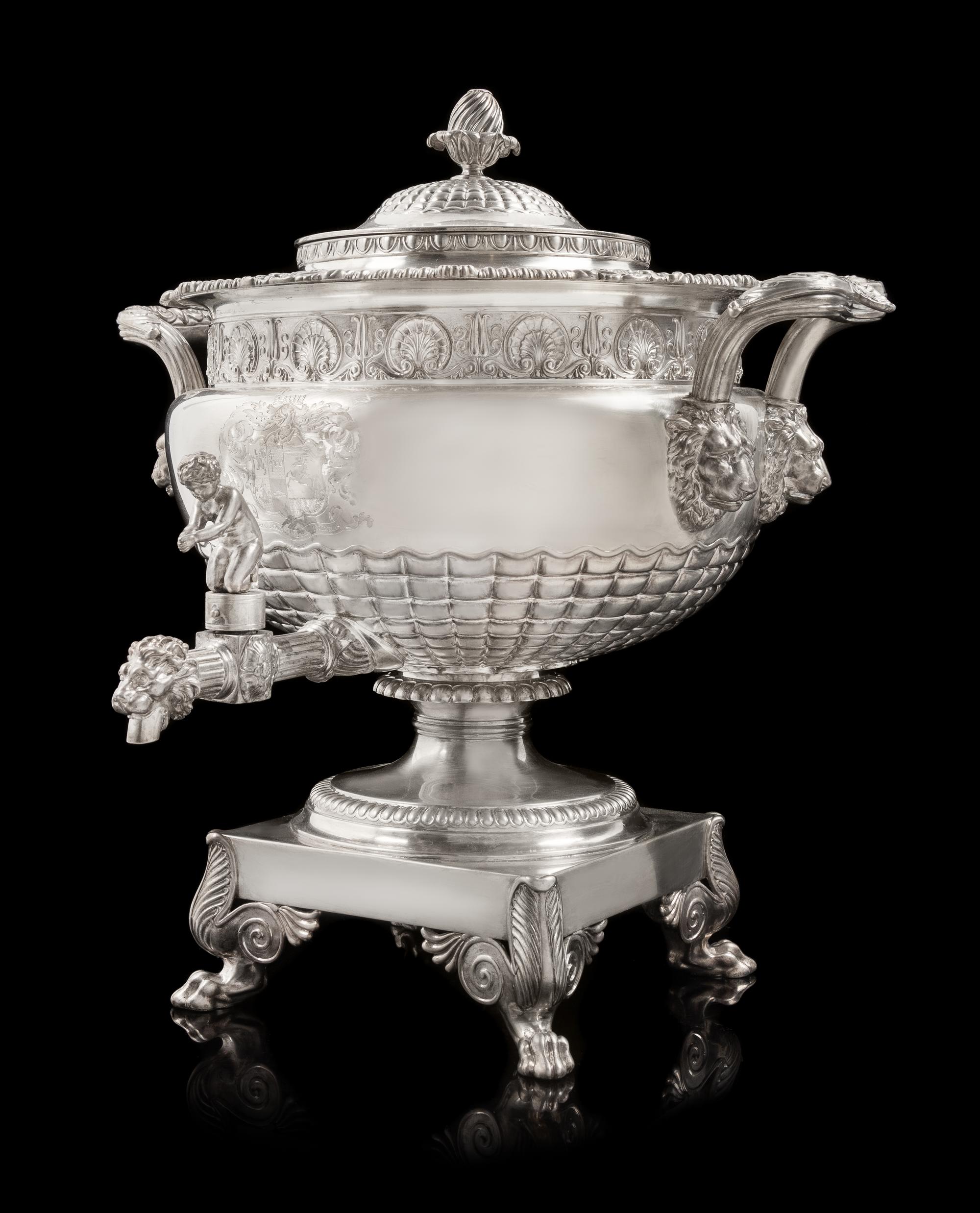 A George III Silver Tea Urn, Paul Storr, London, 1813, the domed lid with a blossom finial, the body with a gadroon and rocaille rim ab
