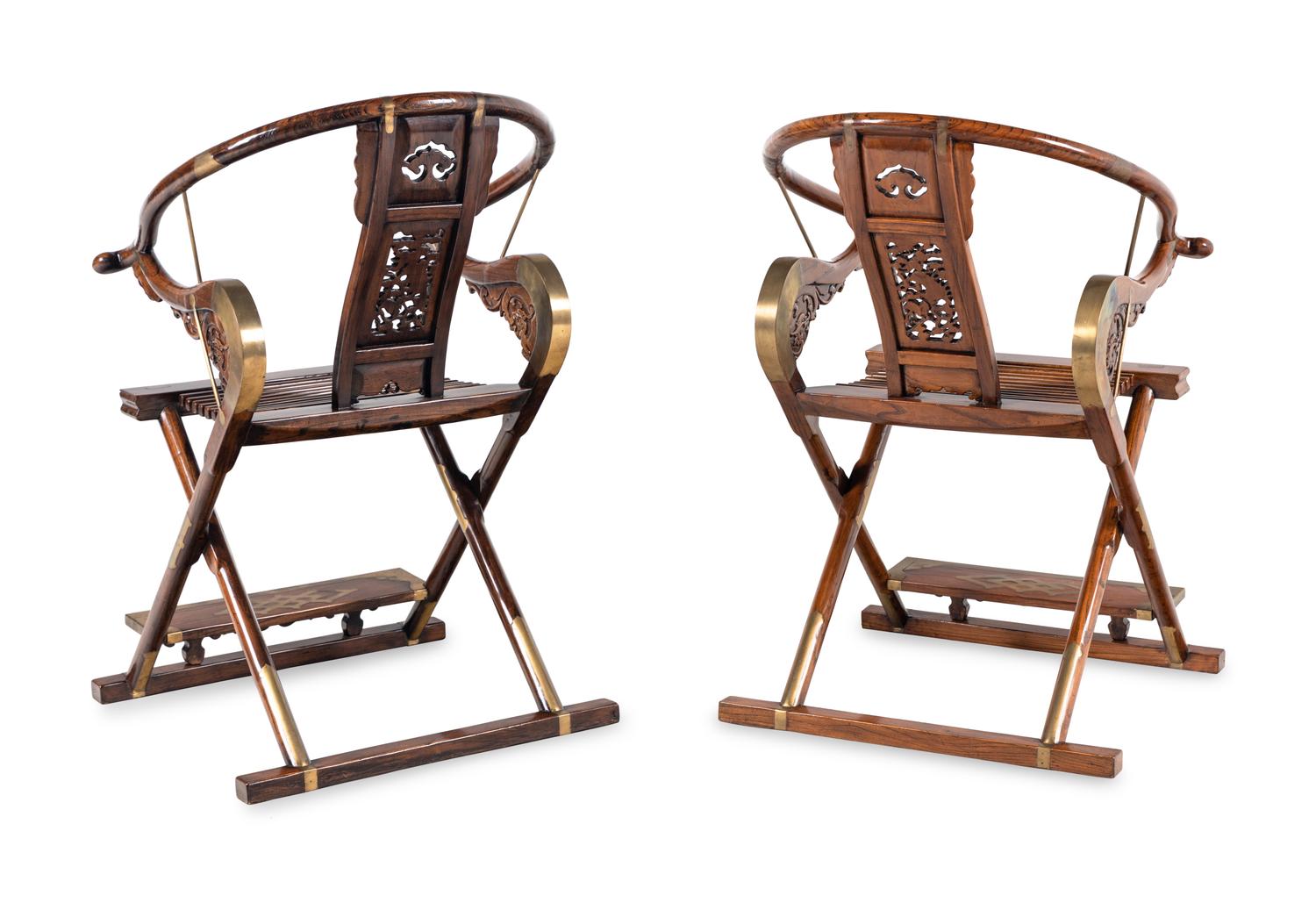 A Pair of Chinese Brass Mounted Hardwood Horseshoe-Back Campaign Chairs