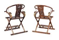 A Pair of Chinese Brass Mounted Hardwood Horseshoe-Back Campaign Chairs