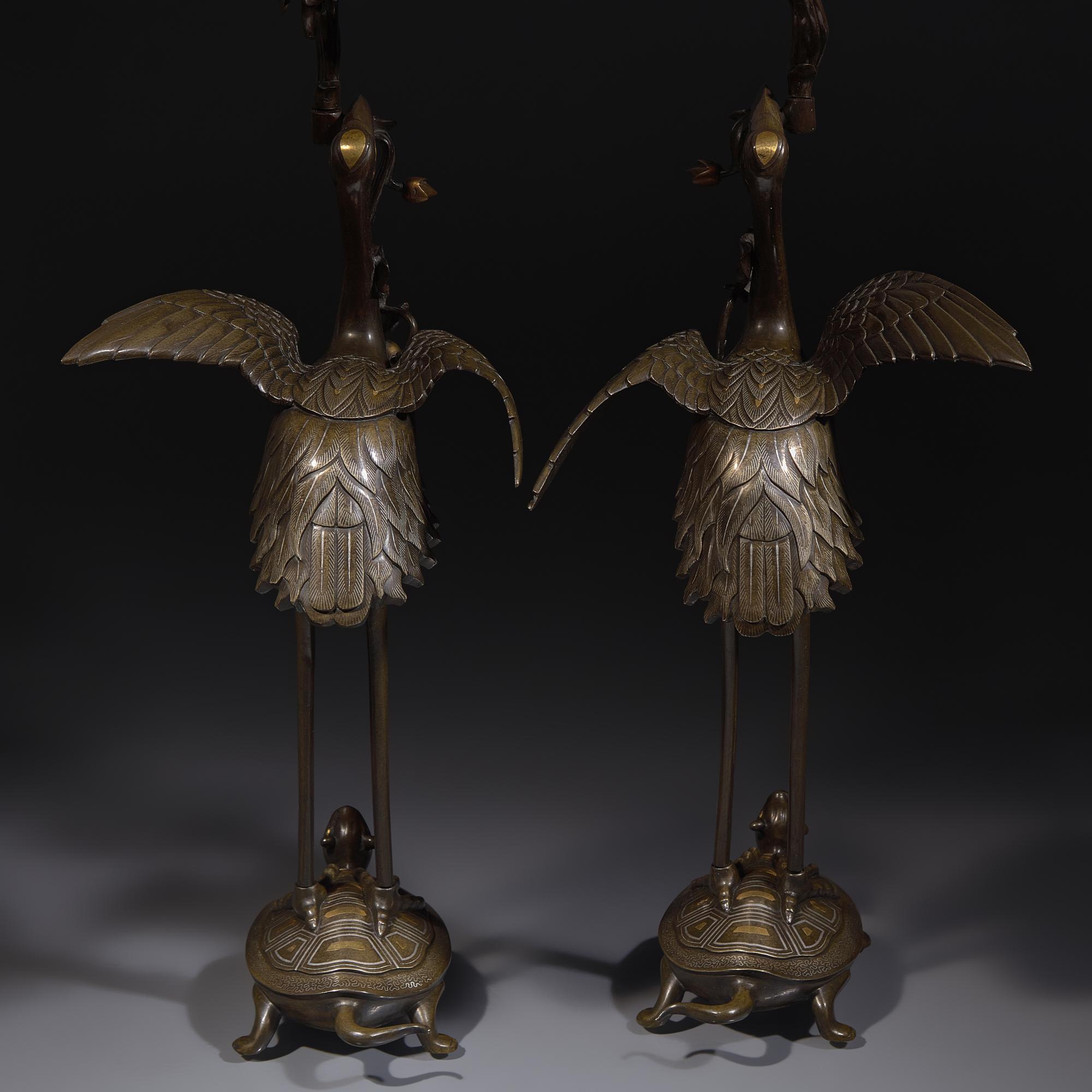 A Pair of Japanese Kaga Style Inlaid Bronze 'Crane and Minogame' Candelabra, Meiji Period — 日本明治時期 銅龜鶴齊齡燭臺一對