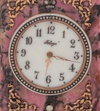 A Carved Hardstone, Enamel, 14-Karat Gold and Hardstone Mounted Three-Piece Clock Garniture