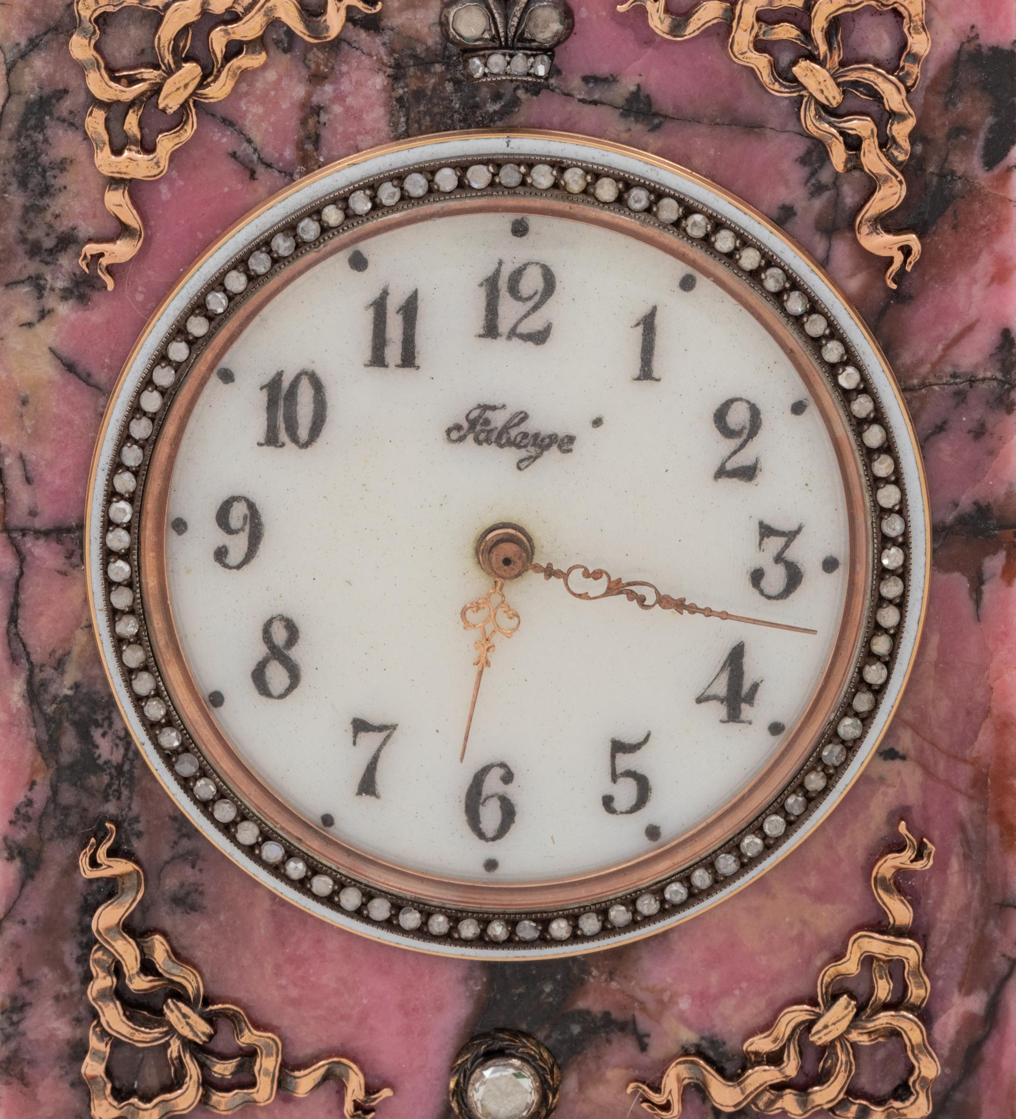 A Carved Hardstone, Enamel, 14-Karat Gold and Hardstone Mounted Three-Piece Clock Garniture