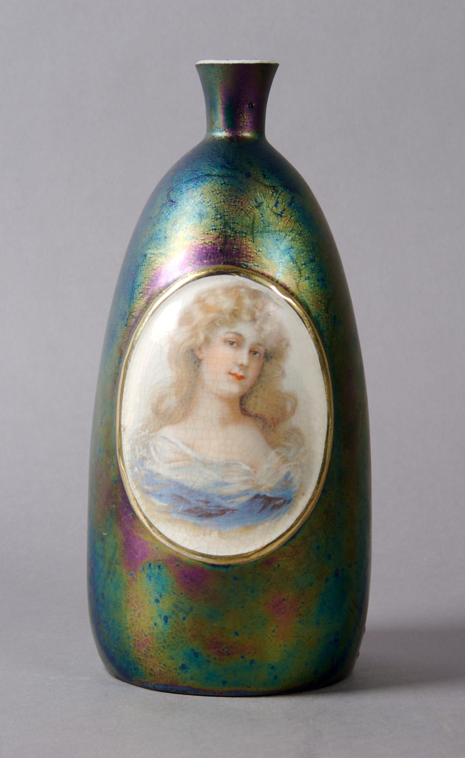 A Royal Rudelstadt Iridescent Vase, Height 8 inches.