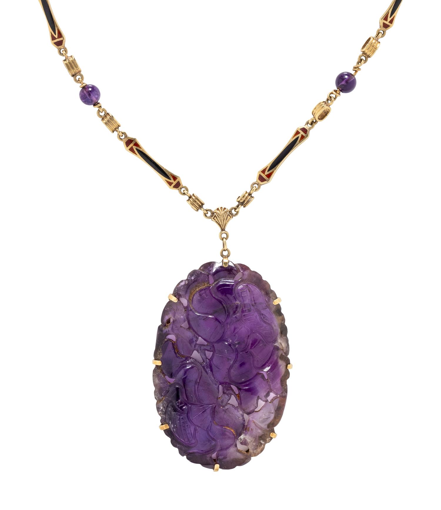 COLLECTION OF YELLOW GOLD AND CARVED AMETHYST JEWELRY