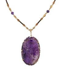COLLECTION OF YELLOW GOLD AND CARVED AMETHYST JEWELRY