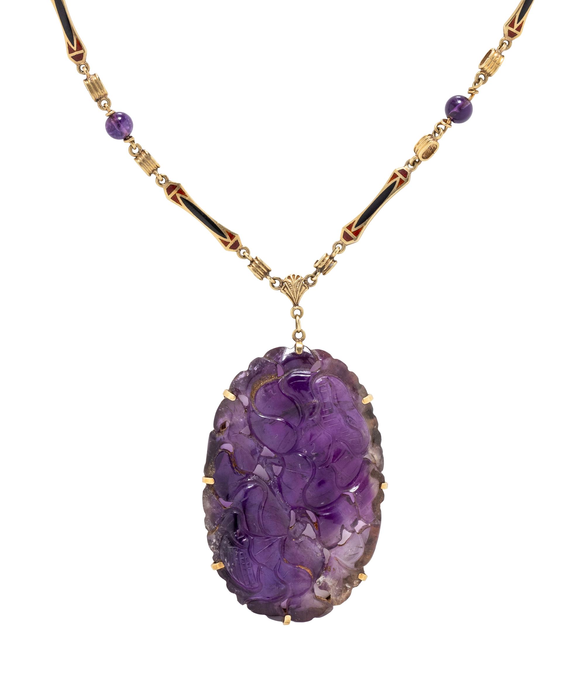 COLLECTION OF YELLOW GOLD AND CARVED AMETHYST JEWELRY