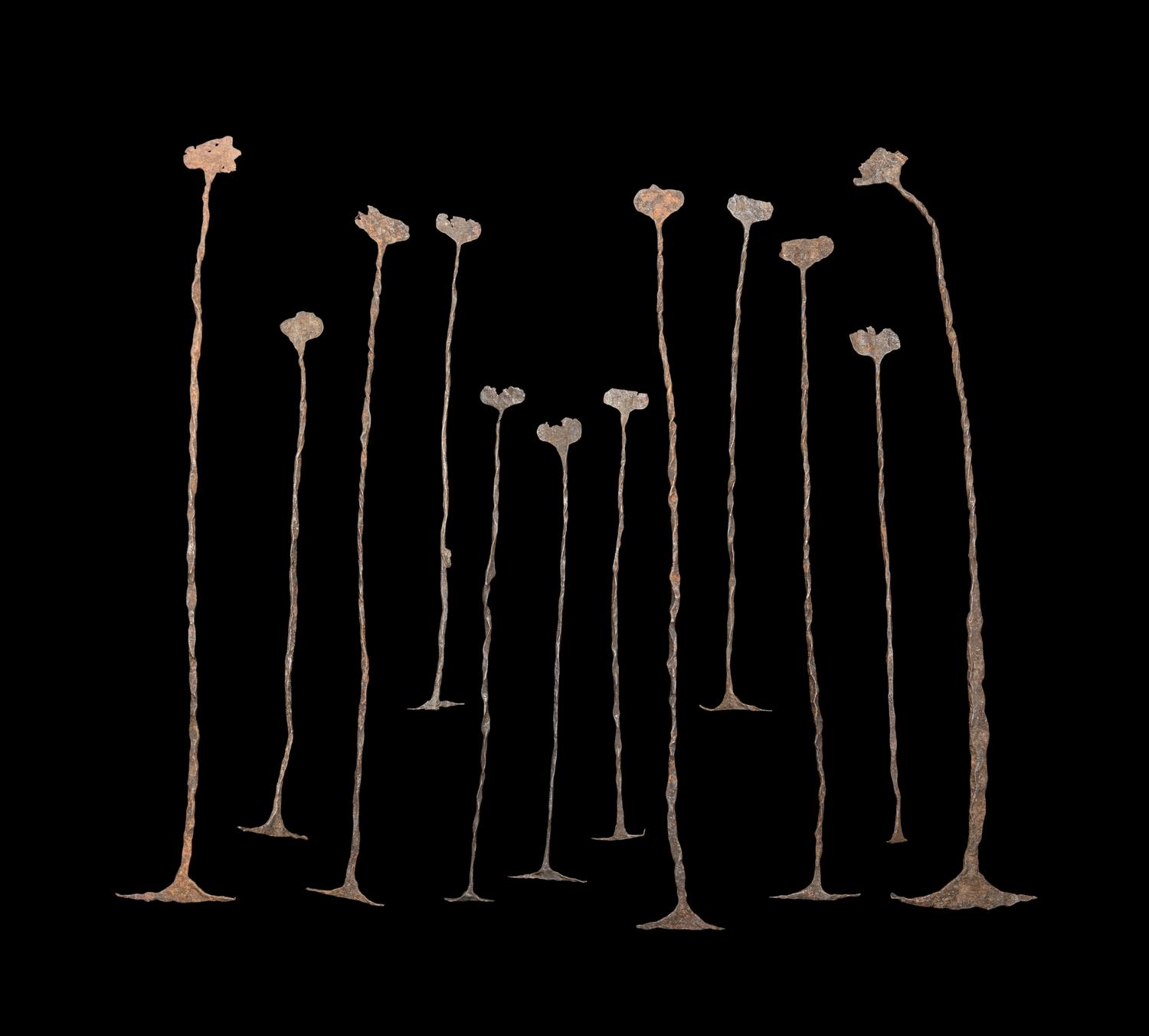 A Group of Kissi Iron Pennies (Currency)