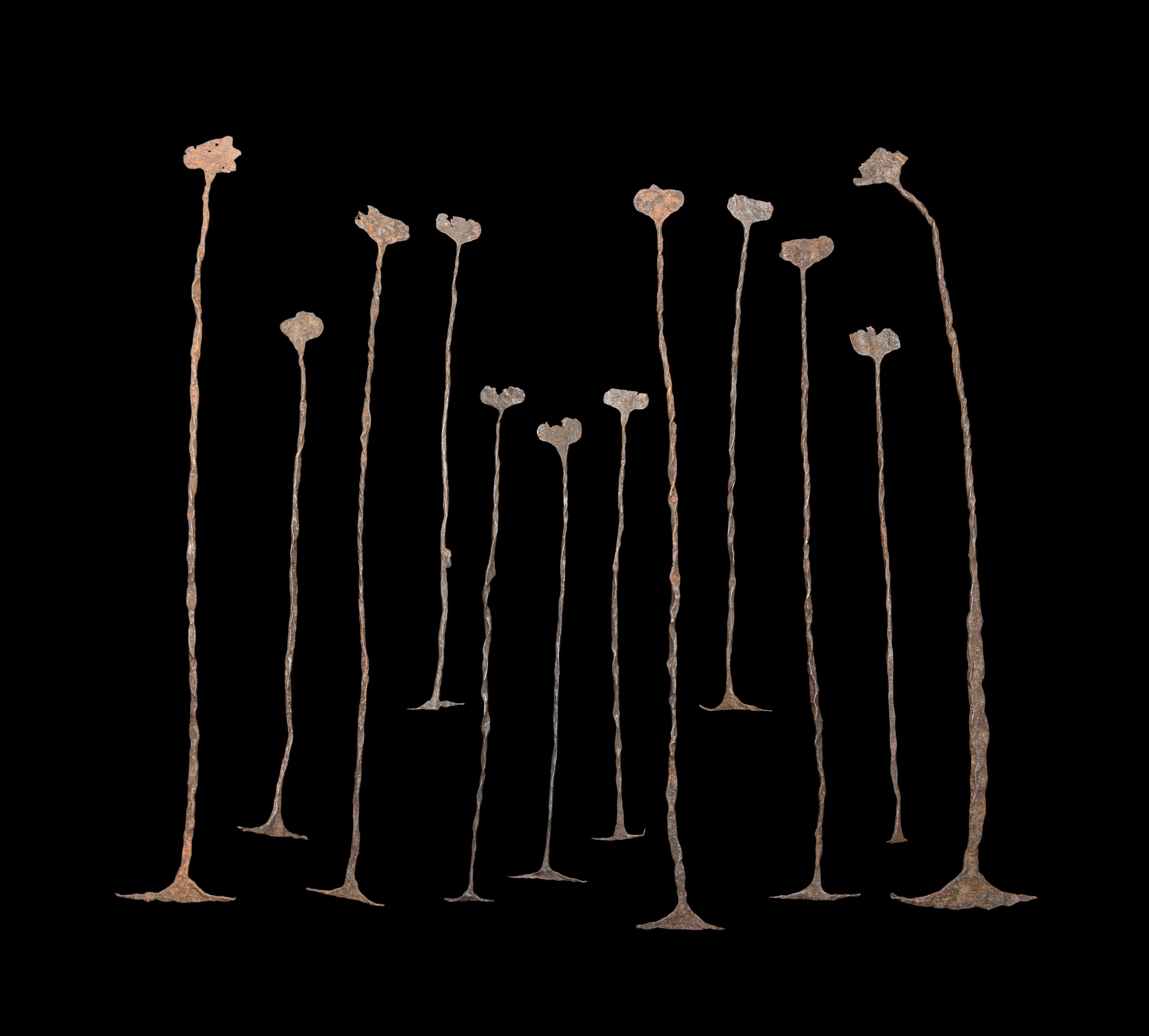 A Group of Kissi Iron Pennies (Currency)