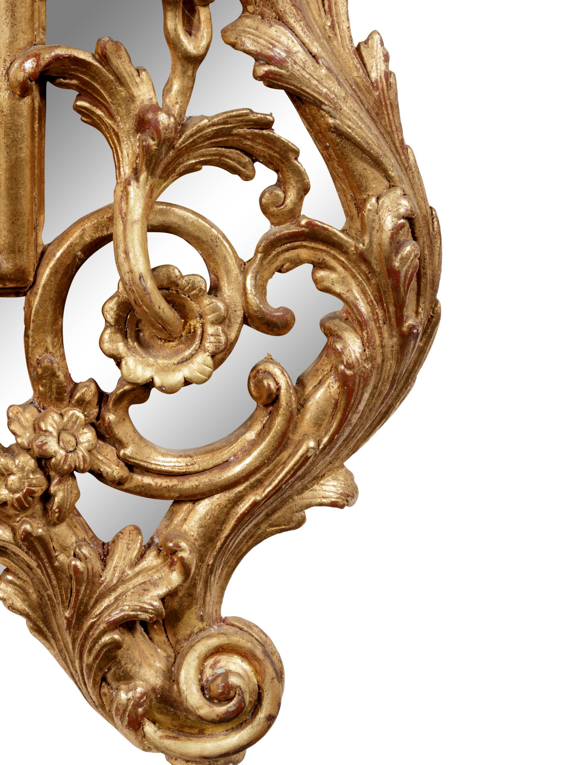 A Pair of Rococo Revival Giltwood Mirrors