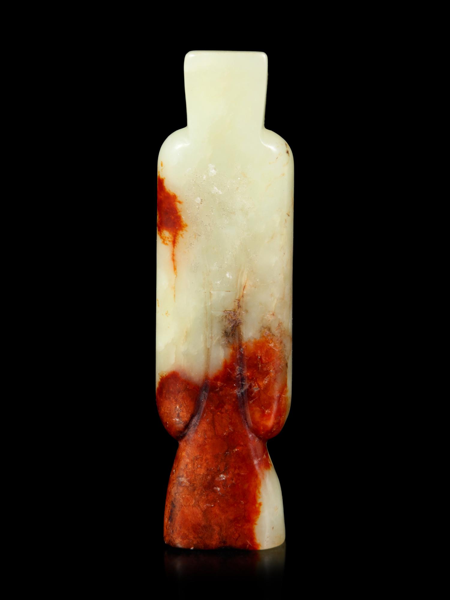 A Yellow and Russet Jade Figure of a Man