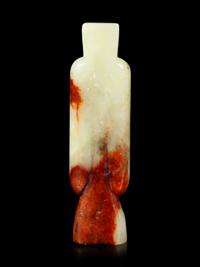A Yellow and Russet Jade Figure of a Man