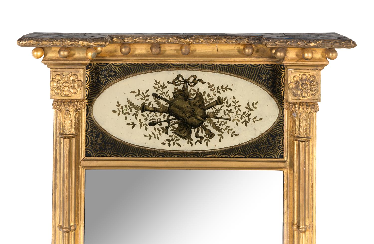A Classical Giltwood and Églomisé Mirror