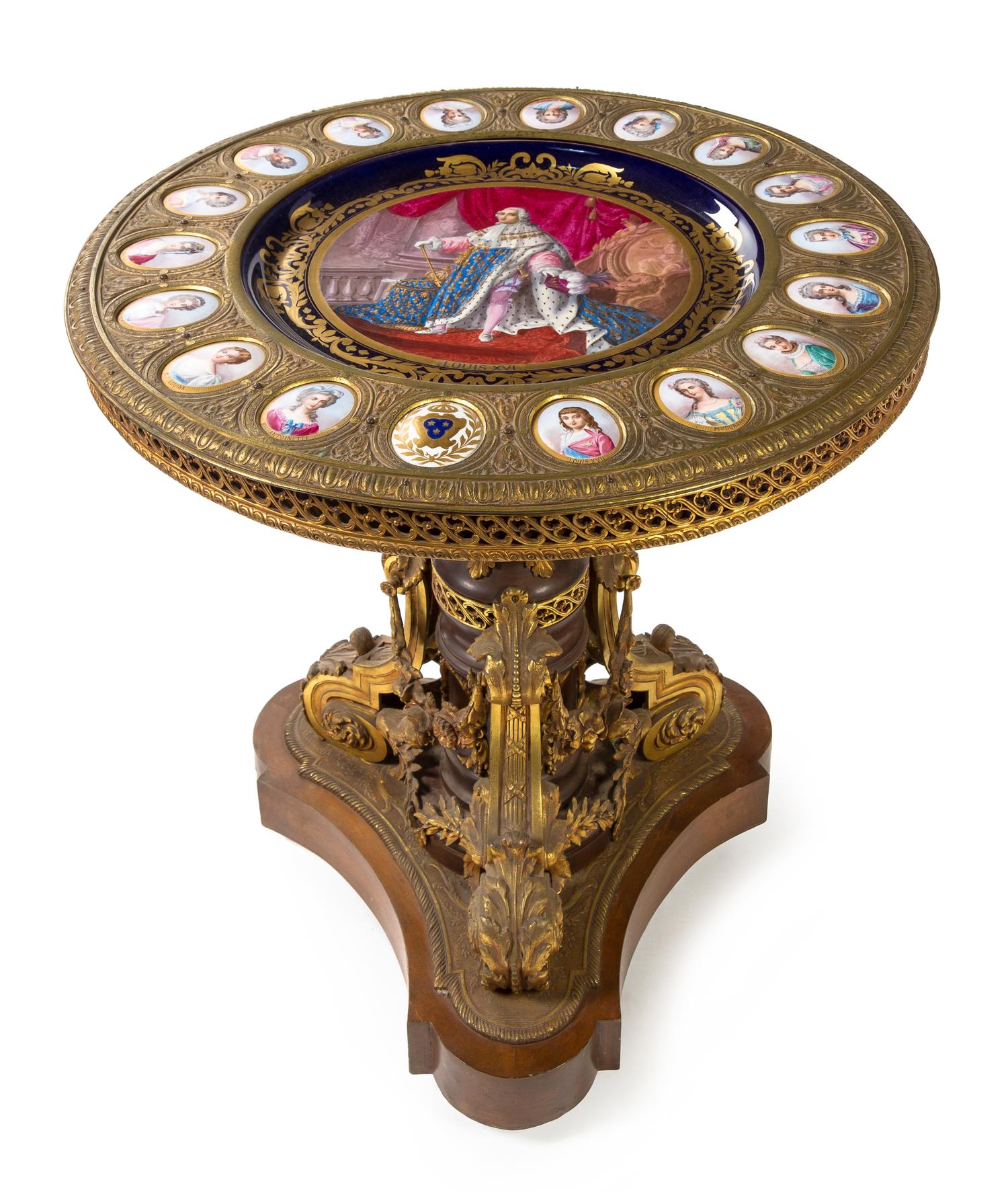 A Louis XVI Style Gilt Bronze and Sevres Porcelain Mounted Gueridon Height 32 1/4 x diameter of top 31 inches. — 19TH CENTURY