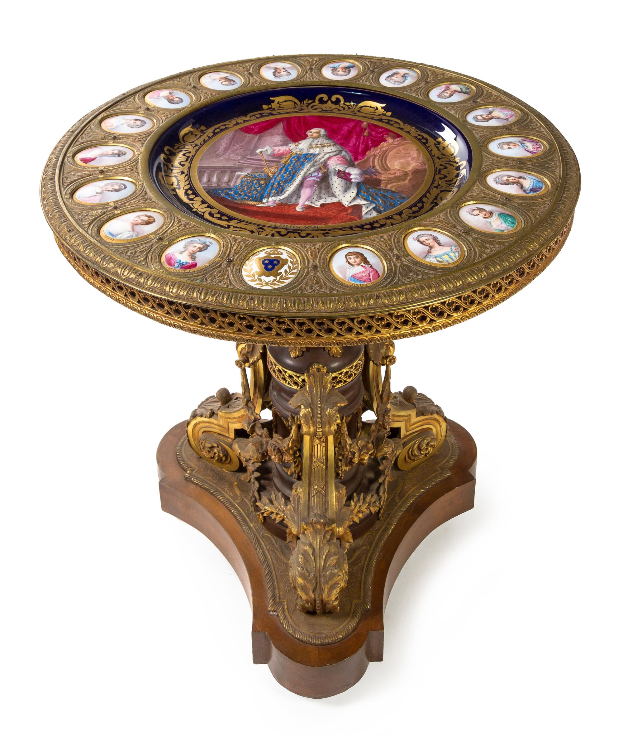 A Louis XVI Style Gilt Bronze and Sevres Porcelain Mounted Gueridon Height 32 1/4 x diameter of top 31 inches. — 19TH CENTURY