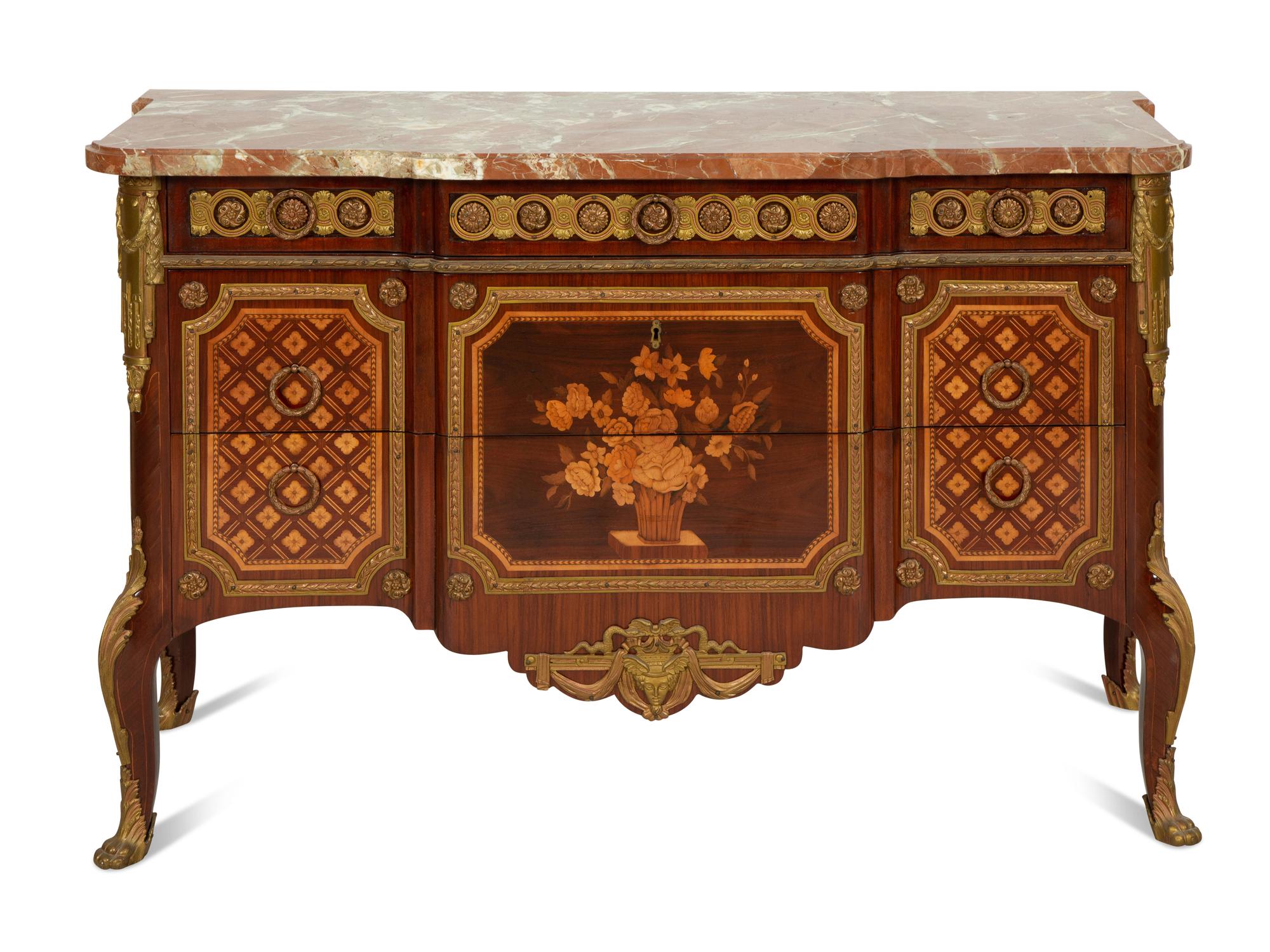 A Louis XV/XVI Transitional Style Gilt Metal Mounted Marquetry Marble-Top Commode