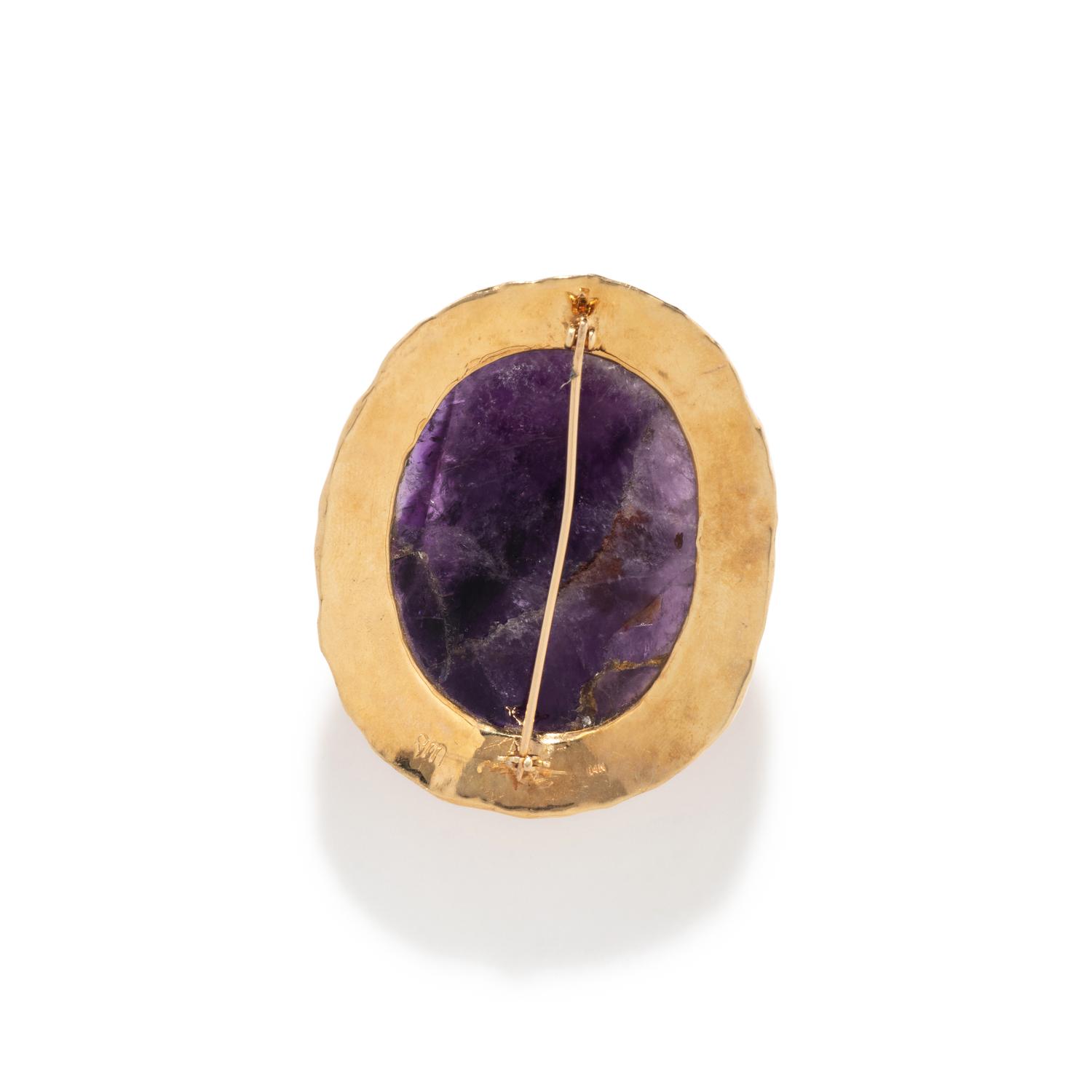A Neoclassical Gold and Amethyst Cameo Brooch with a Portrait of the God Zeus