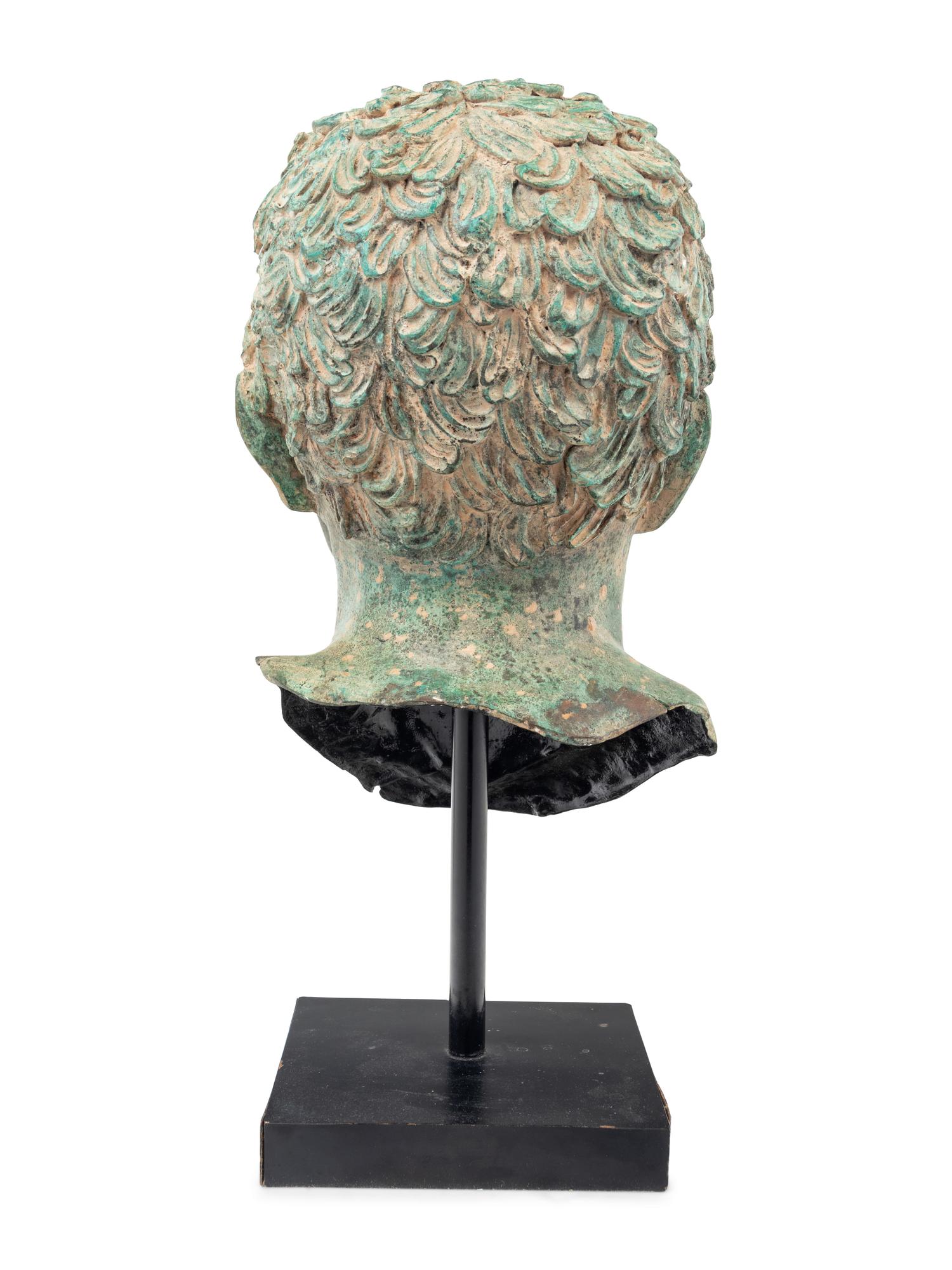 A Patinated Metal Portrait Head