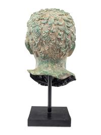 A Patinated Metal Portrait Head