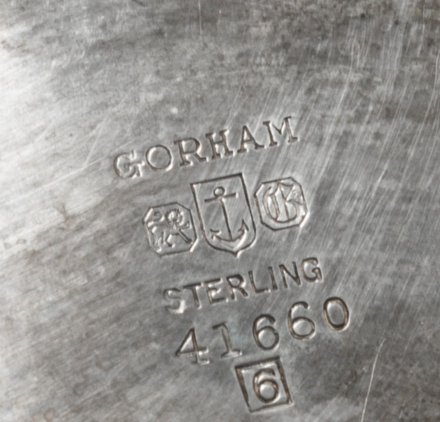 An American Silver "Revere" Bowl, Gorham Mfg. Co., Providence, RI, 1956, the deep circular bowl with a flared rim raised on a short mol