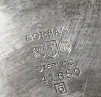 An American Silver "Revere" Bowl, Gorham Mfg. Co., Providence, RI, 1956, the deep circular bowl with a flared rim raised on a short mol