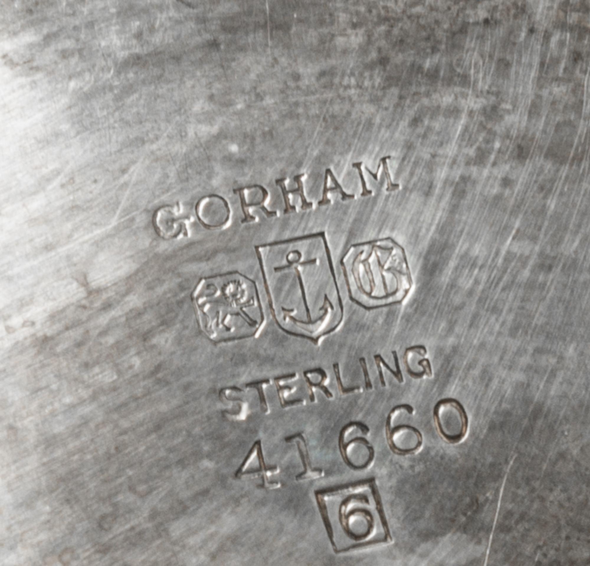 An American Silver "Revere" Bowl, Gorham Mfg. Co., Providence, RI, 1956, the deep circular bowl with a flared rim raised on a short mol
