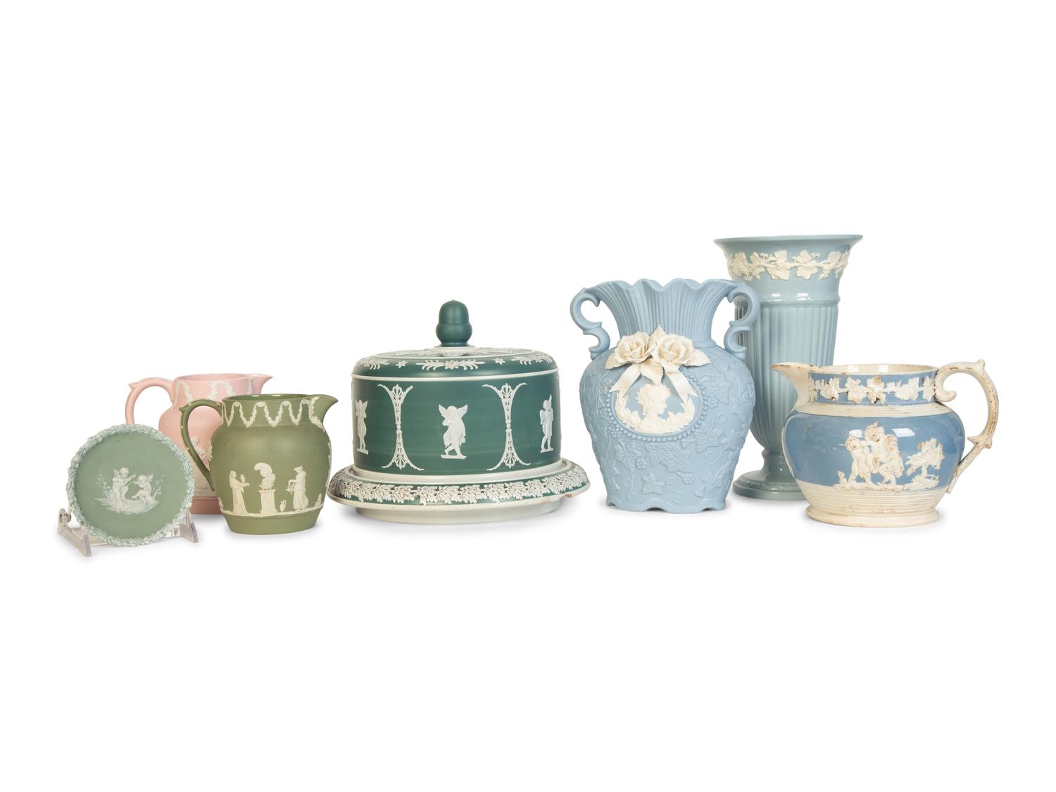 Seven Jasperware Pitchers and Table Articles